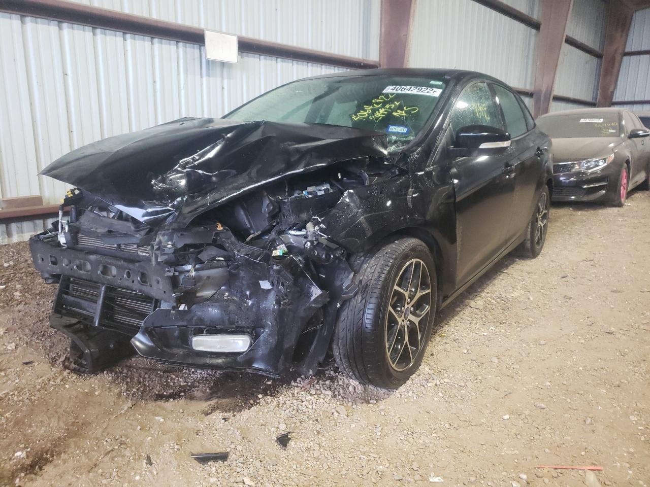 Photo 2 from auction – 2018 FORD FOCUS SEL with VIN 1FADP3H21JL249952