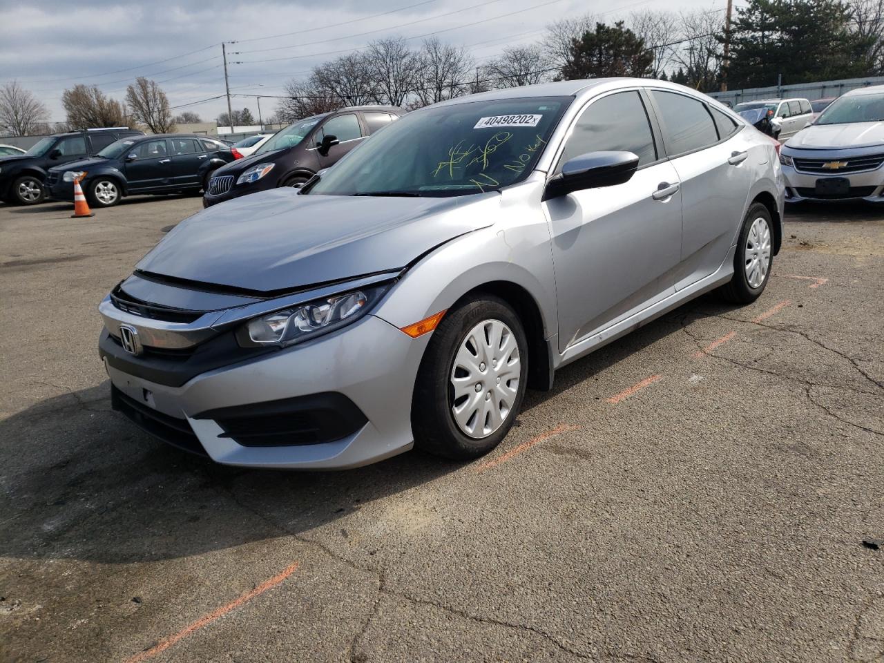 Photo 2 from auction – 2017 HONDA CIVIC LX with VIN 19XFC2F59HE049510