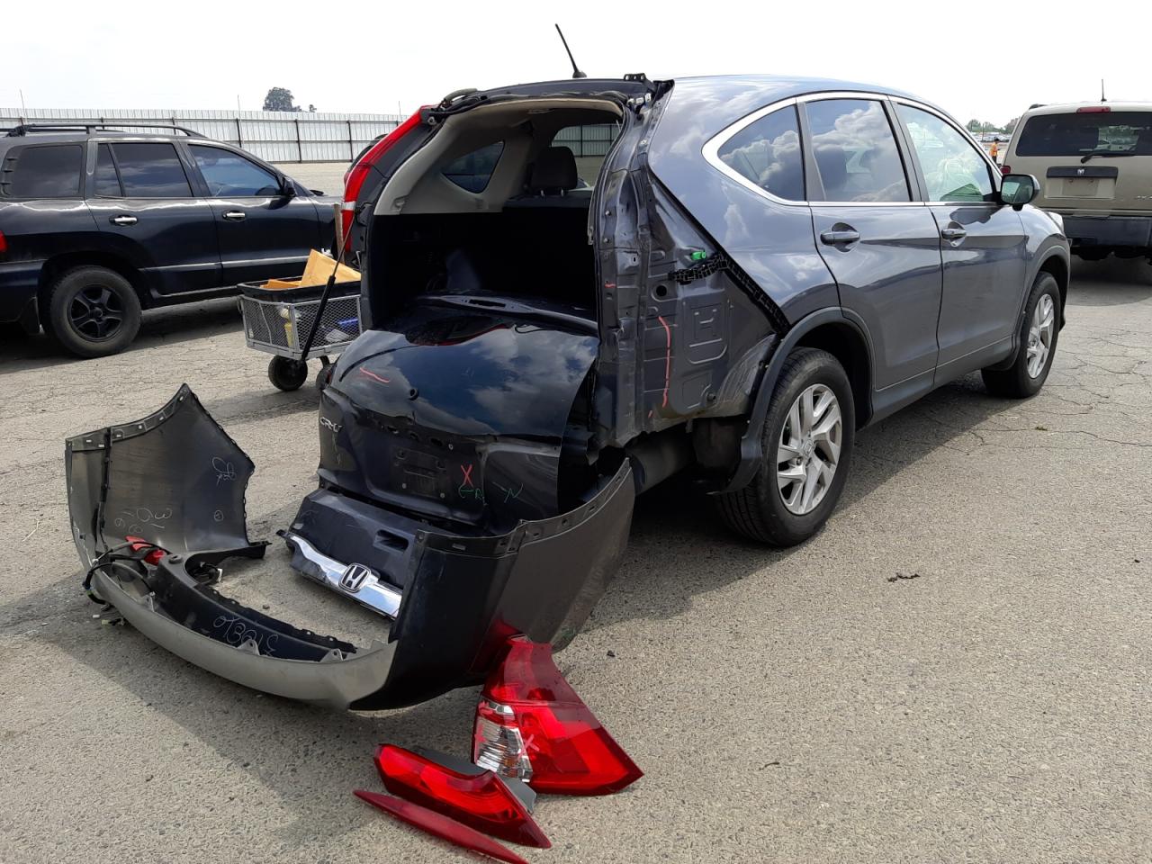 Photo 4 from auction – 2016 HONDA CR-V EX with VIN 3CZRM3H52GG720977