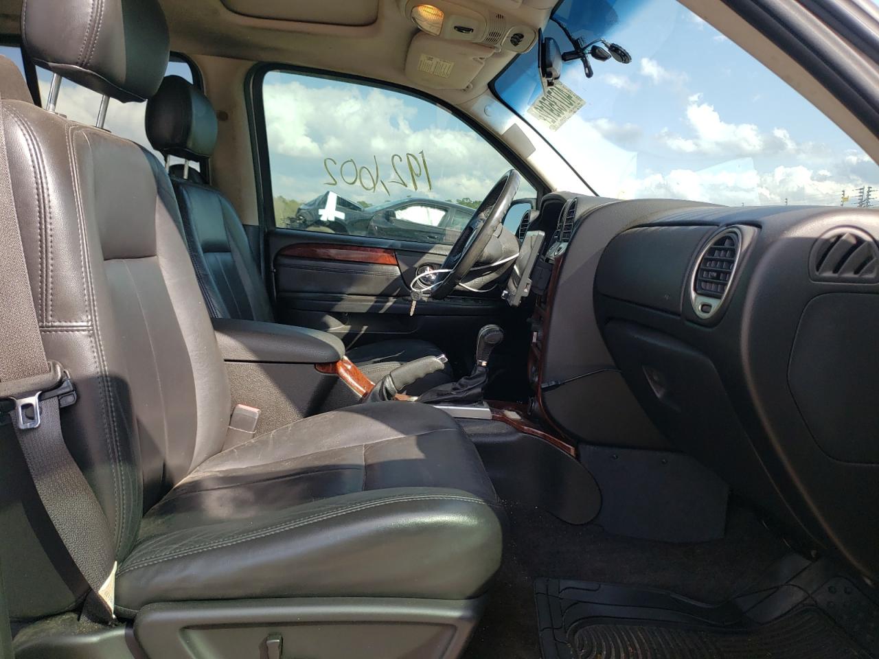 Photo 5 from auction – 2006 GMC ENVOY with VIN 1GKDS13S962165531