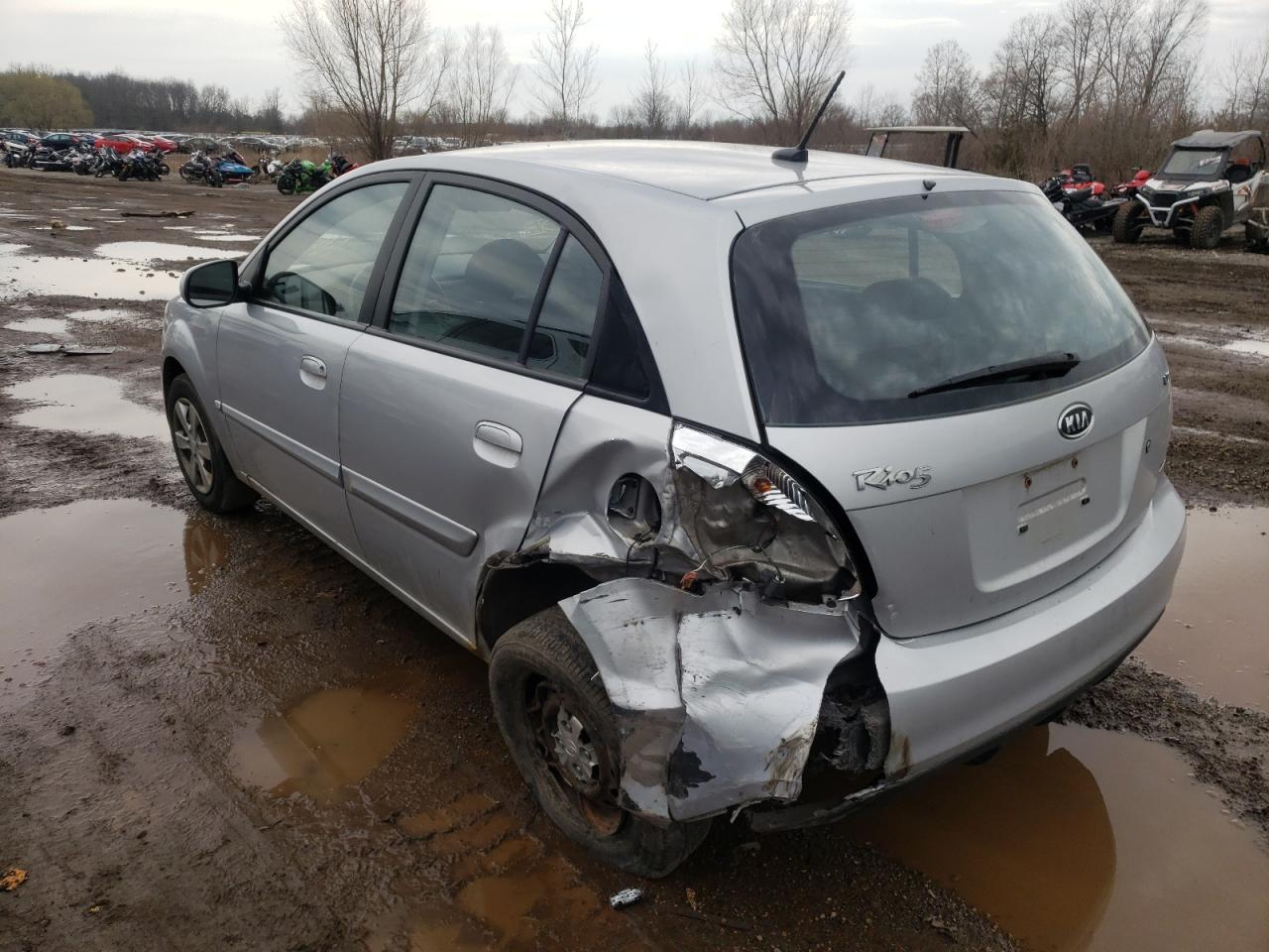 Photo 3 from auction – 2011 KIA RIO BASE with VIN KNADH5A36B6748183