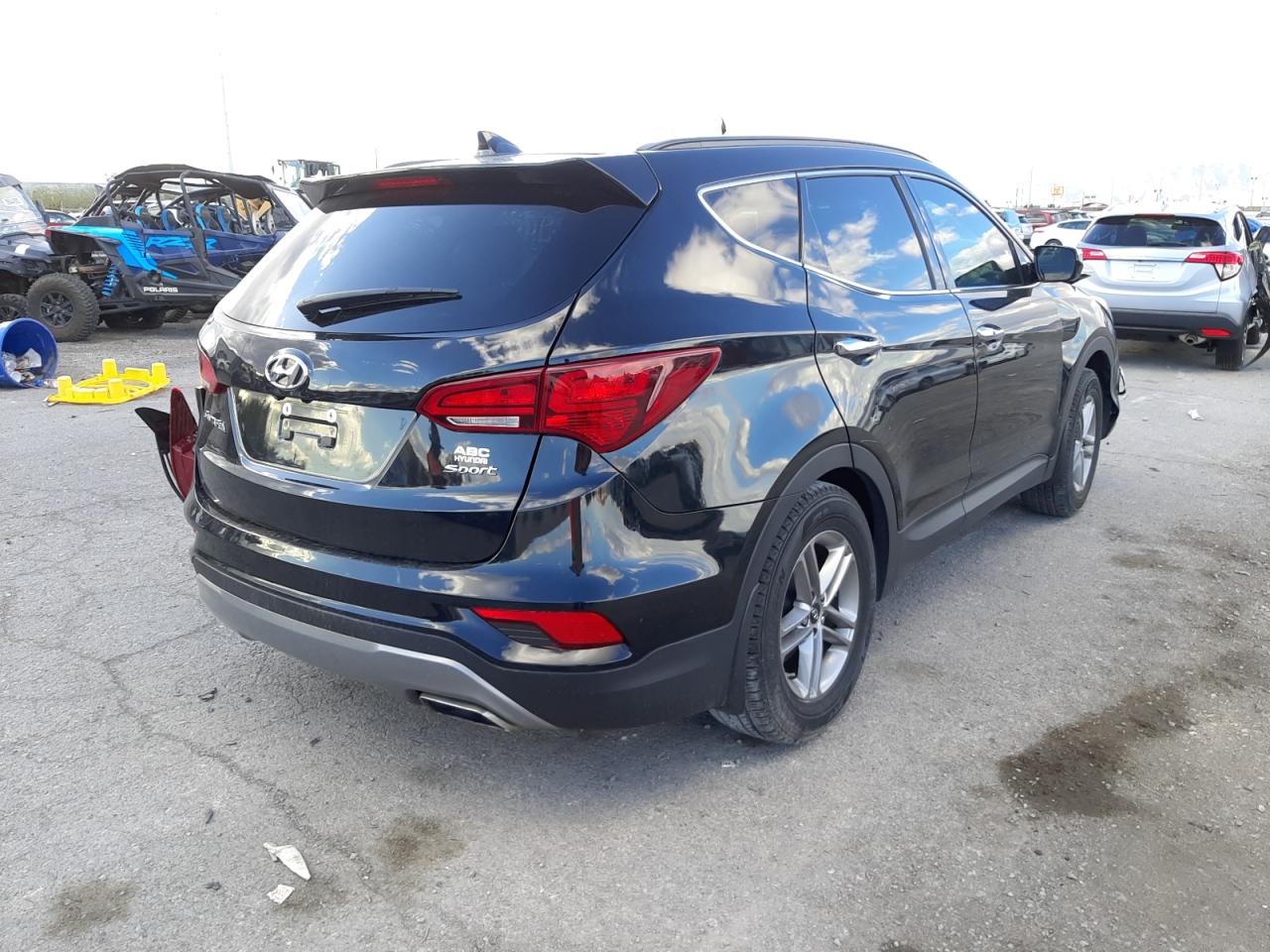 Photo 4 from auction – 2017 HYUNDAI SANTA FE S with VIN 5NMZU3LB3HH026145