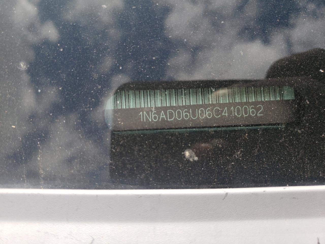 Photo 10 from auction – 2006 NISSAN FRONTIER K with VIN 1N6AD06U06C410062