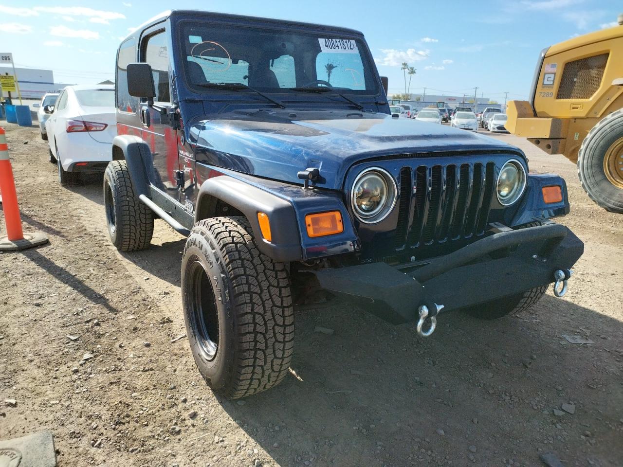 JEEP WRANGLER / 2000 with VIN 1J4FA49S3YP798624 - Photo from auction