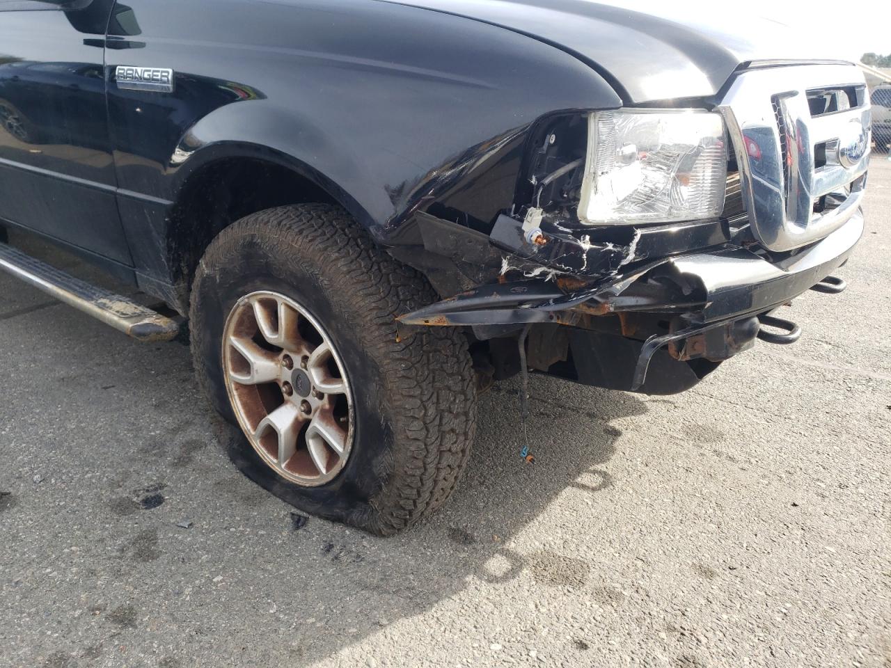 Photo 9 from auction – 2011 FORD RANGER SUP with VIN 1FTLR4FE1BPB18677