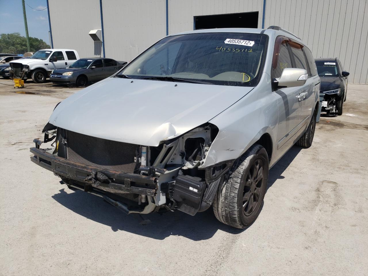 Photo 2 from auction – 2014 KIA SEDONA LX with VIN KNDMG4C74E6551372