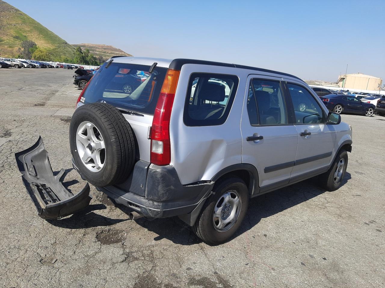 Photo 4 from auction – 2002 HONDA CR-V LX with VIN JHLRD68472C020563