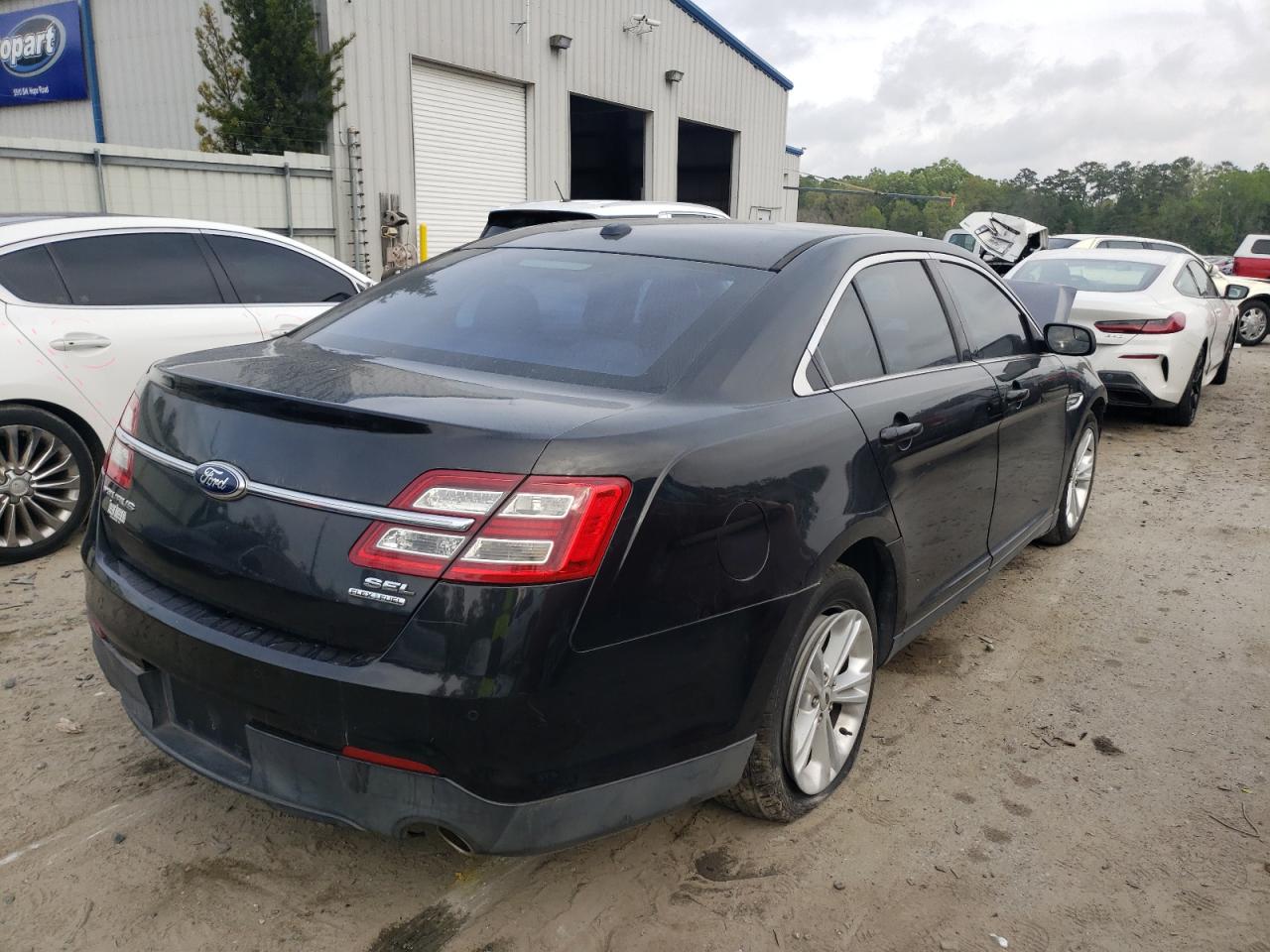 Photo 4 from auction – 2013 FORD TAURUS SEL with VIN 1FAHP2E83DG235939