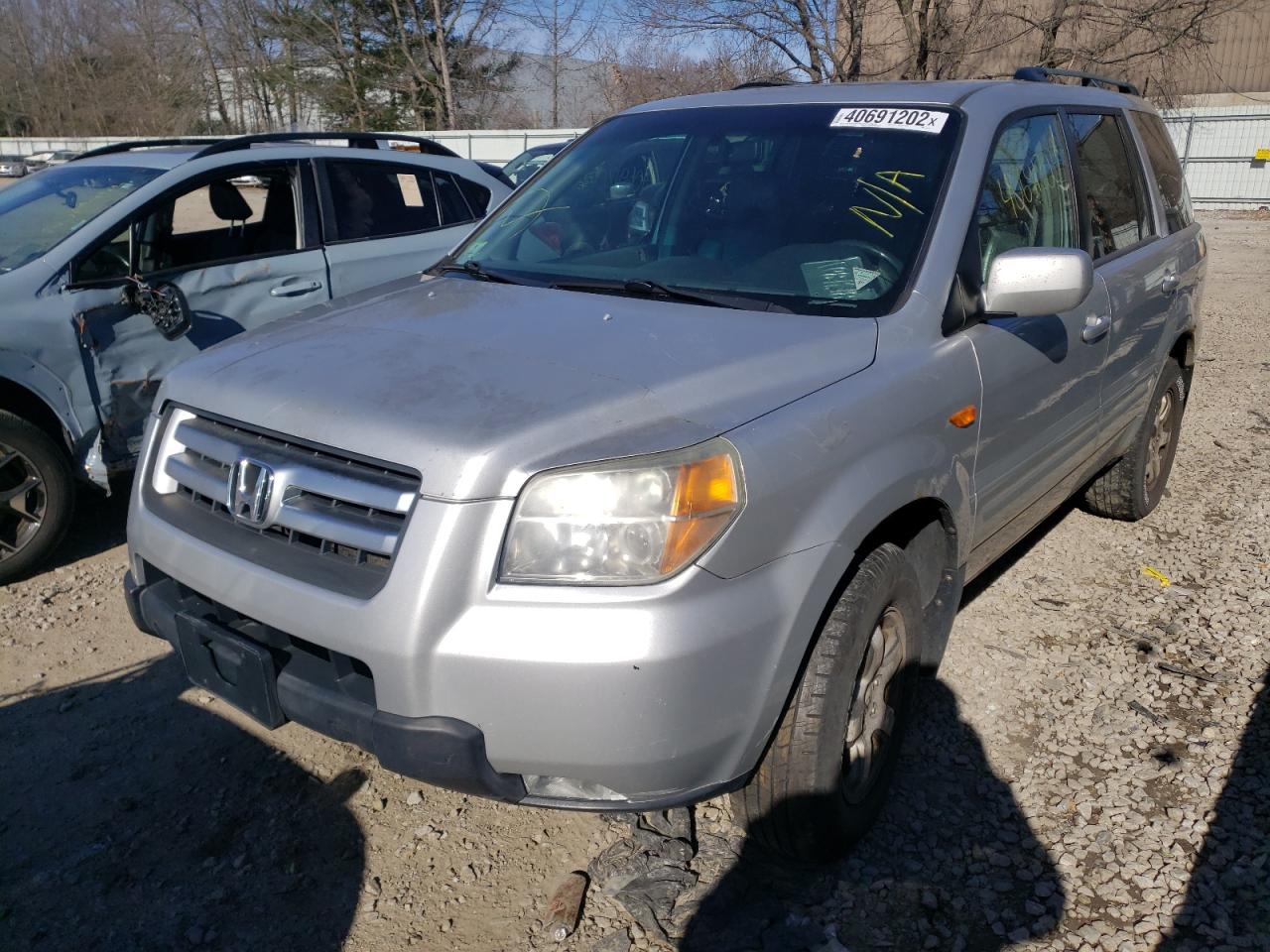 Photo 2 from auction – 2006 HONDA PILOT EX with VIN 2HKYF18616H546737