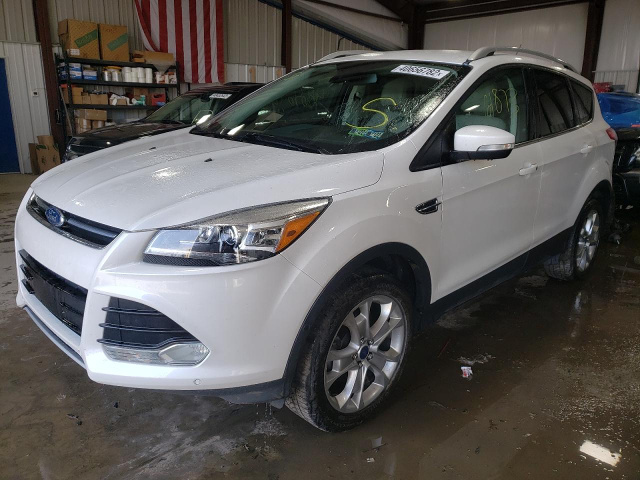Photo 2 from auction – 2015 FORD ESCAPE TIT with VIN 1FMCU0JX3FUC10845