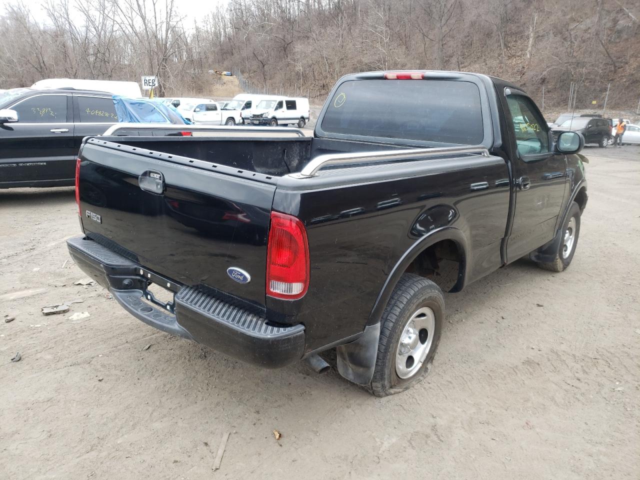 Photo 4 from auction – 2002 FORD F150 with VIN 2FTRF18202CA34923