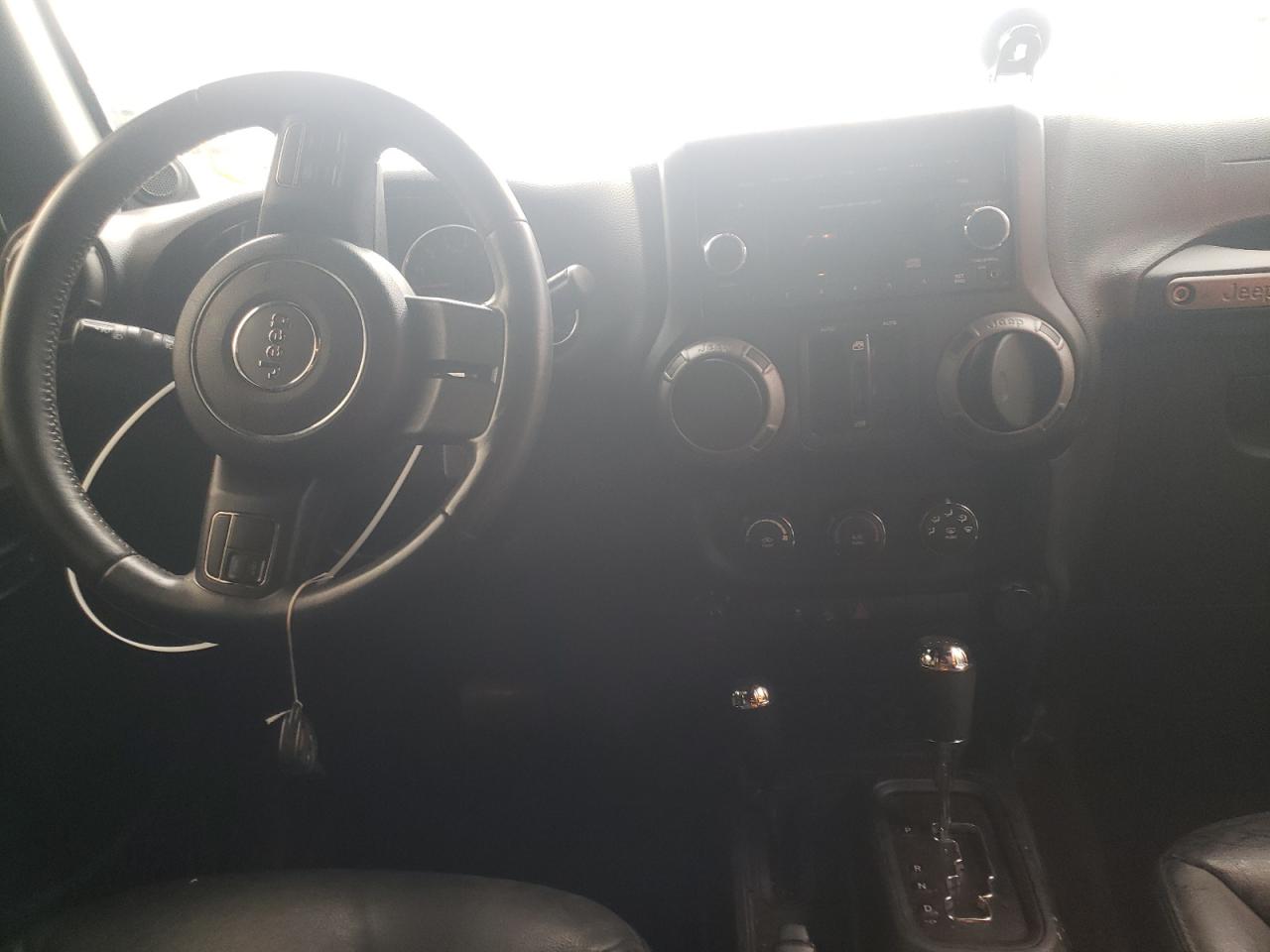 Photo 9 from auction – 2014 JEEP WRANGLER U with VIN 1C4BJWDGXEL133614