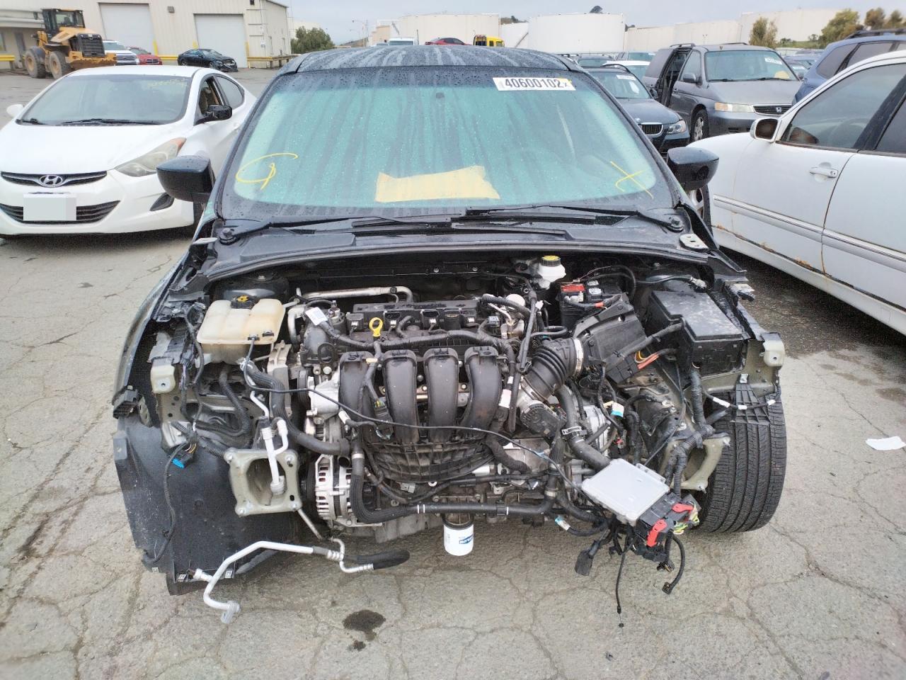 Photo 9 from auction – 2018 FORD FOCUS SE with VIN 1FADP3F21JL252658