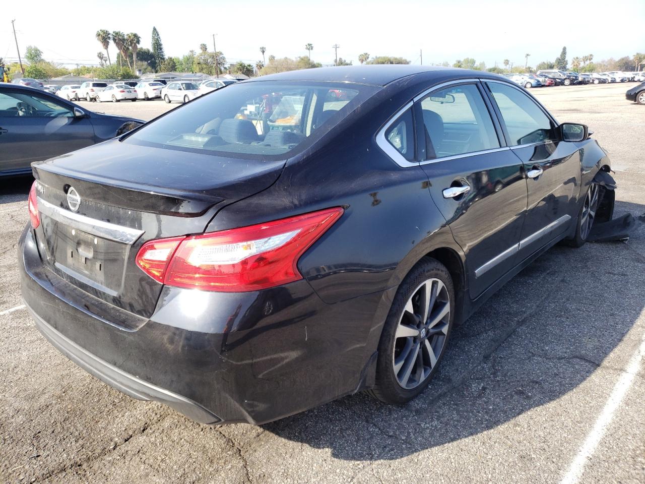 Photo 4 from auction – 2016 NISSAN ALTIMA 2.5 with VIN 1N4AL3AP0GN329938