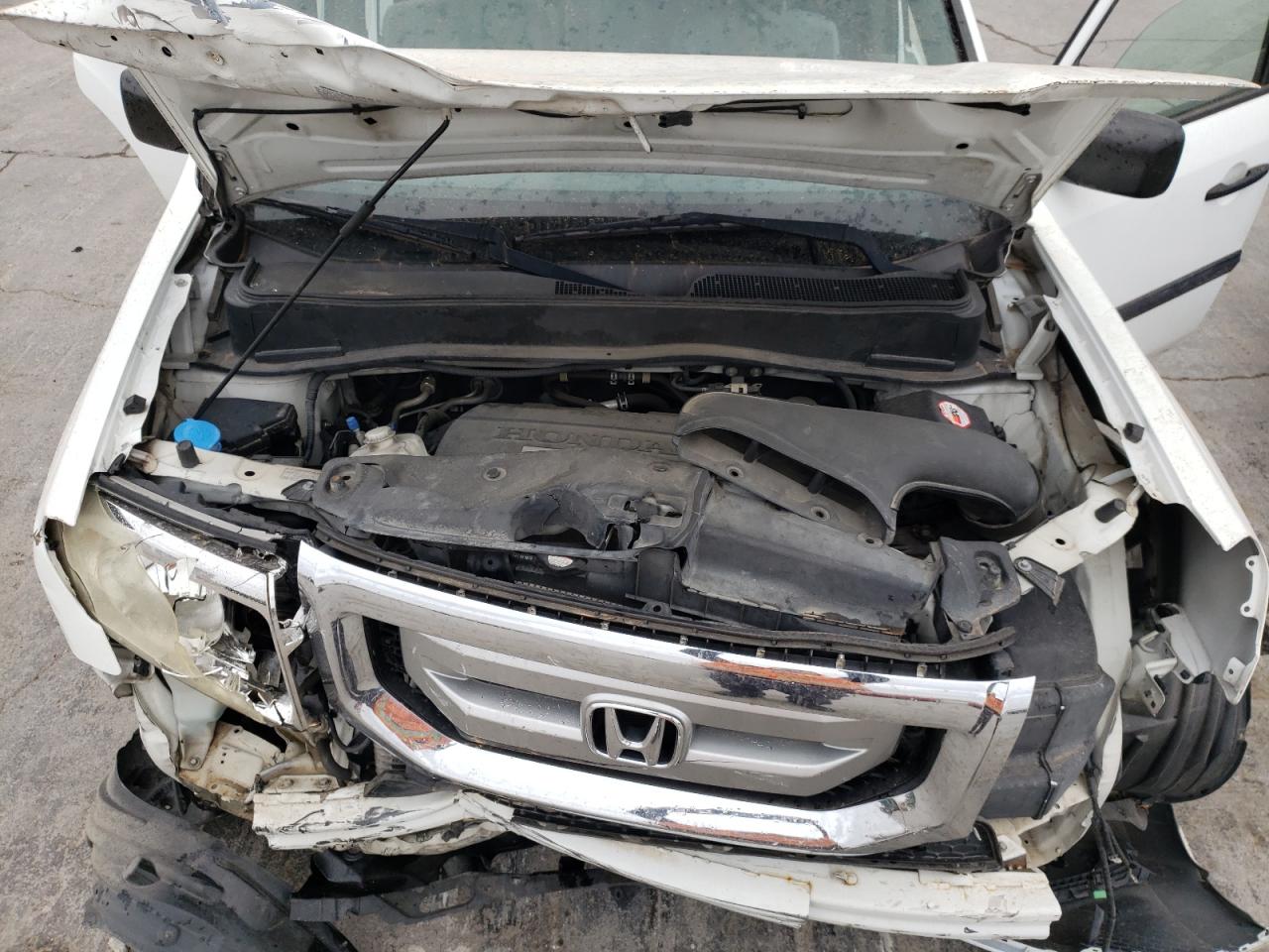 Photo 7 from auction – 2009 HONDA PILOT LX with VIN 5FNYF38239B014322