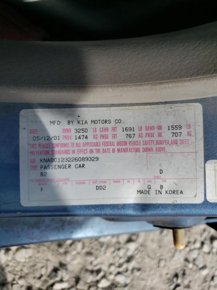 Photo 10 from auction – 2002 KIA RIO with VIN KNADC123226089329