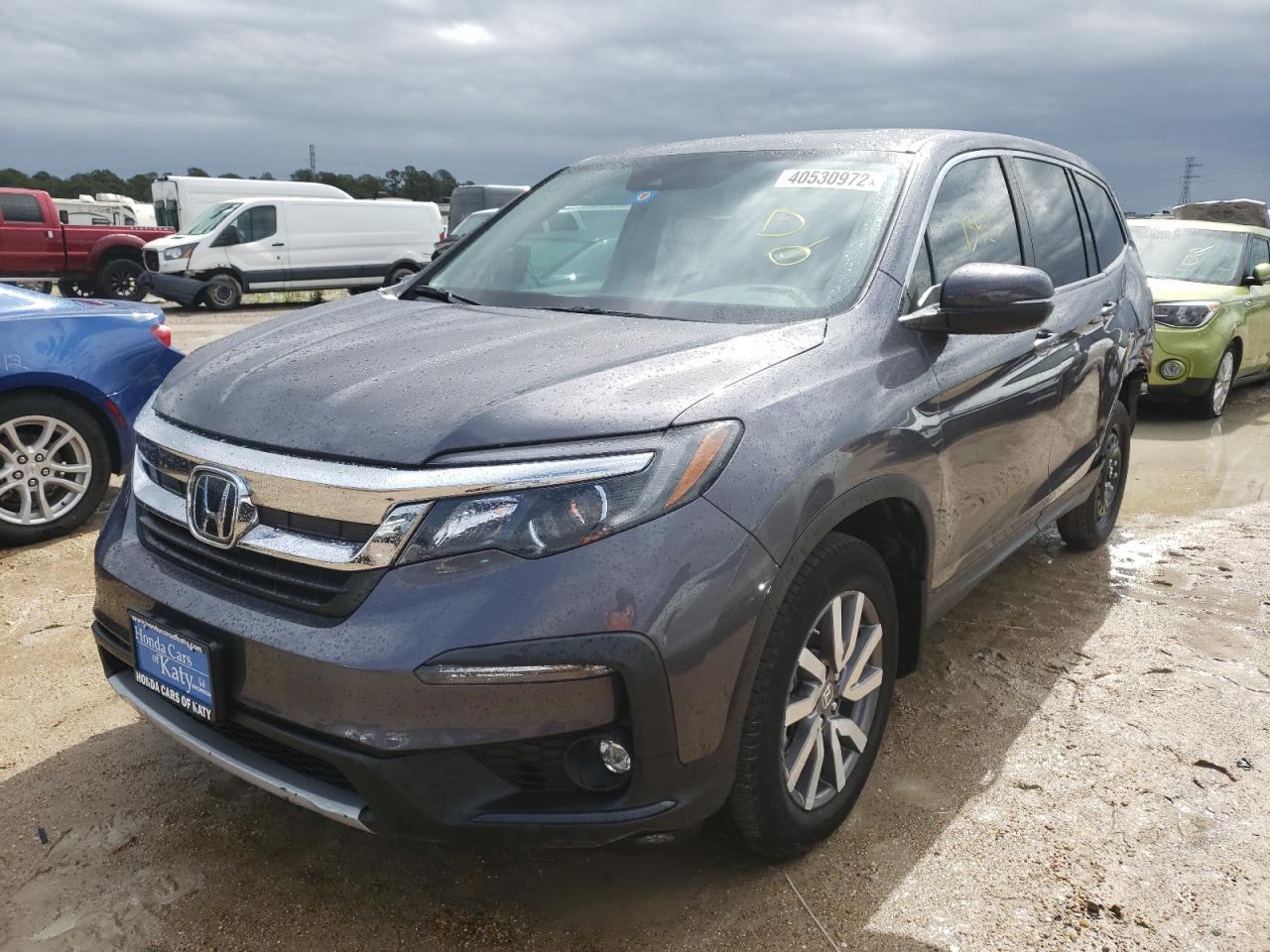 Photo 2 from auction – 2022 HONDA PILOT EXL with VIN 5FNYF5H53NB003921