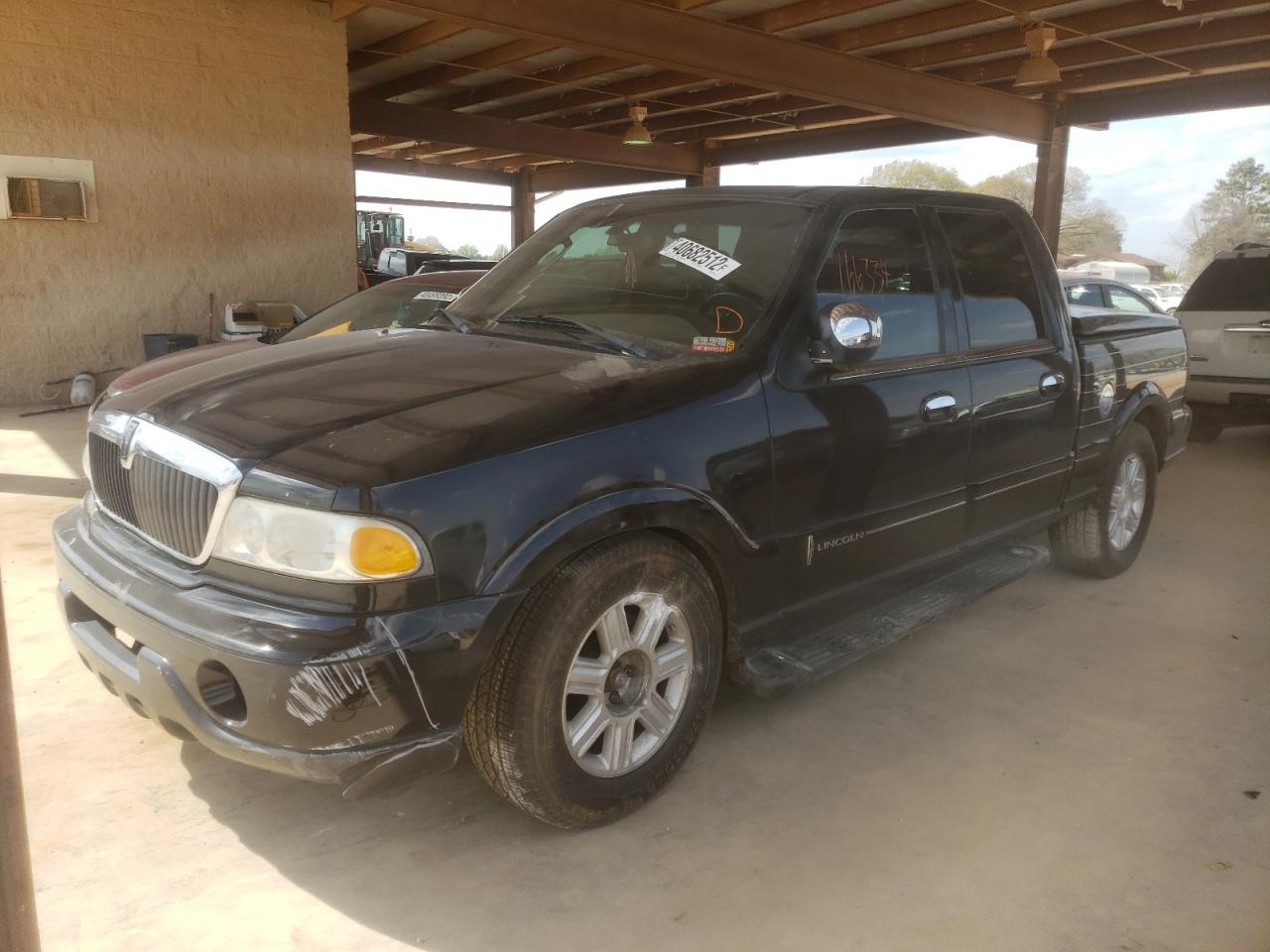 Photo 2 from auction – 2002 LINCOLN BLACKWOOD with VIN 5LTEW05A22KJ03091