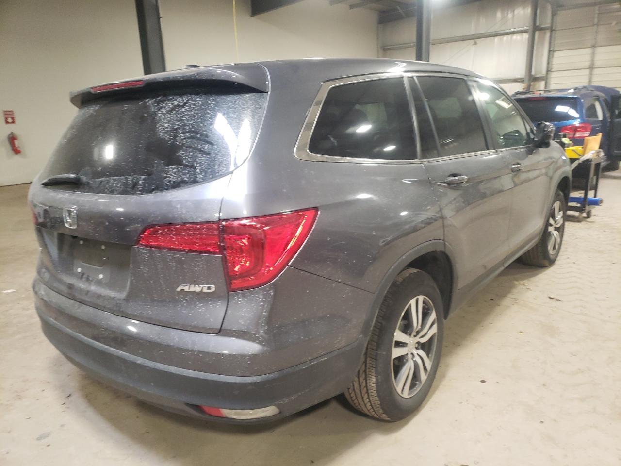 Photo 4 from auction – 2016 HONDA PILOT EXL with VIN 5FNYF6H5XGB108044