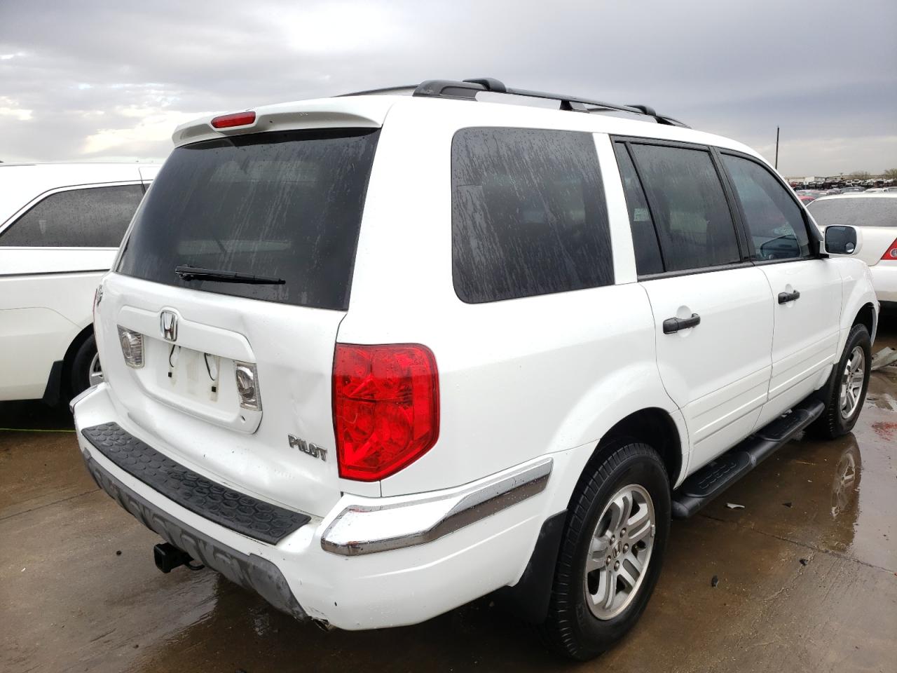 Photo 4 from auction – 2003 HONDA PILOT EX with VIN 2HKYF18423H520626
