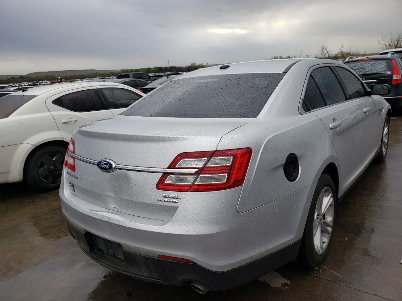Photo 4 from auction – 2014 FORD TAURUS SEL with VIN 1FAHP2E88EG131190