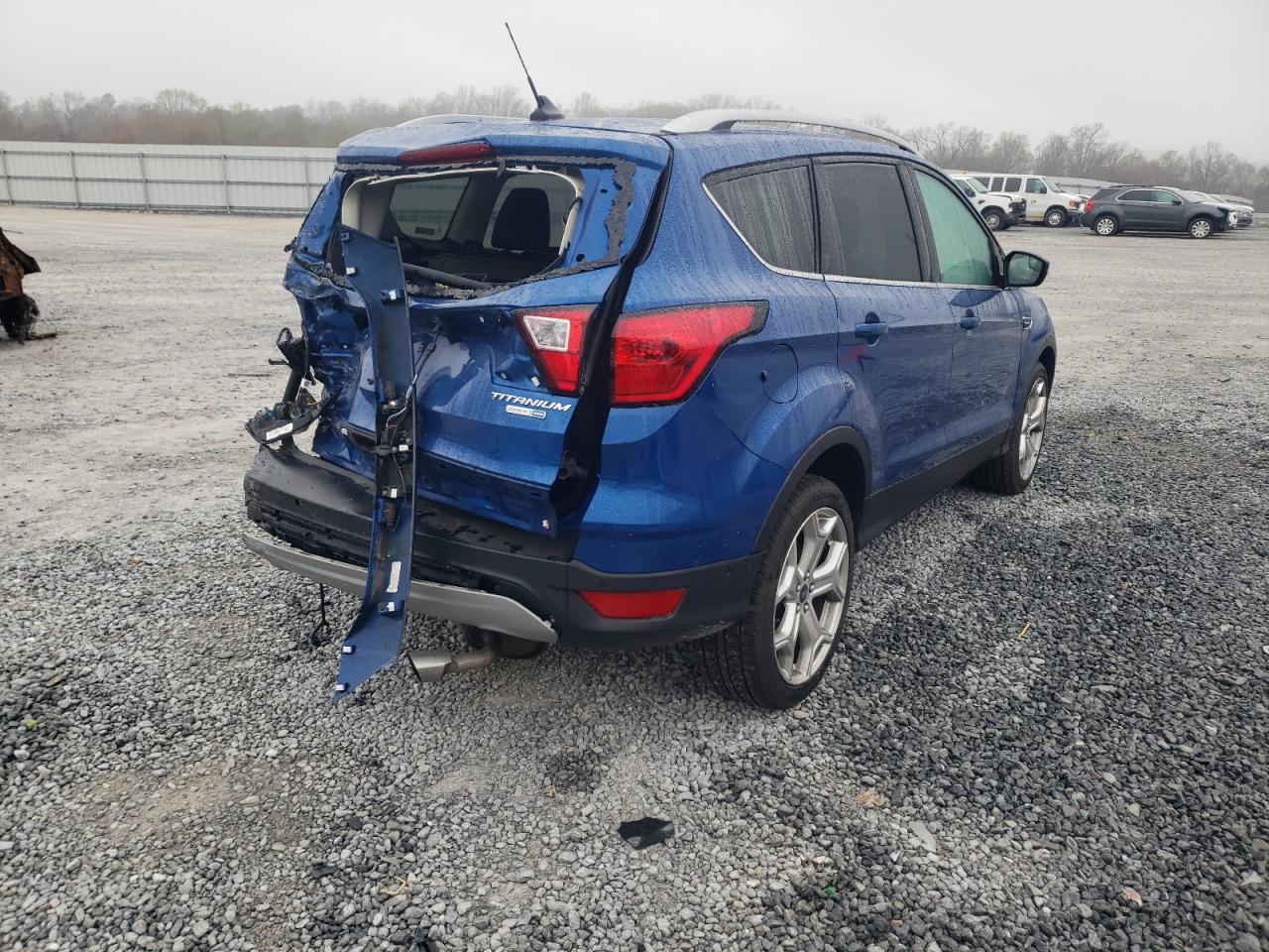 Photo 4 from auction – 2019 FORD ESCAPE TIT with VIN 1FMCU9J93KUA03145