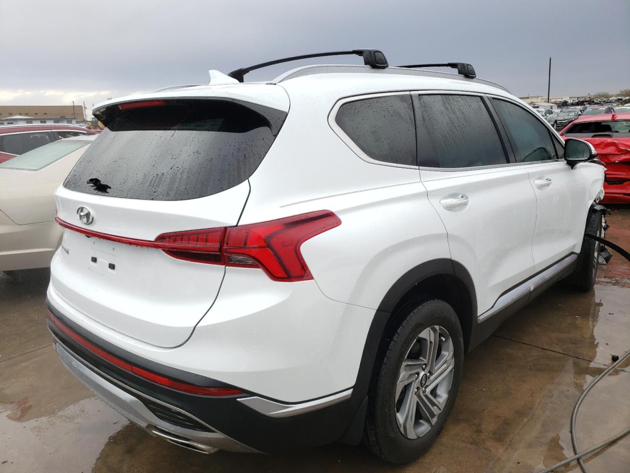 Photo 4 from auction – 2021 HYUNDAI SANTA FE S with VIN 5NMS34AJ4MH363003