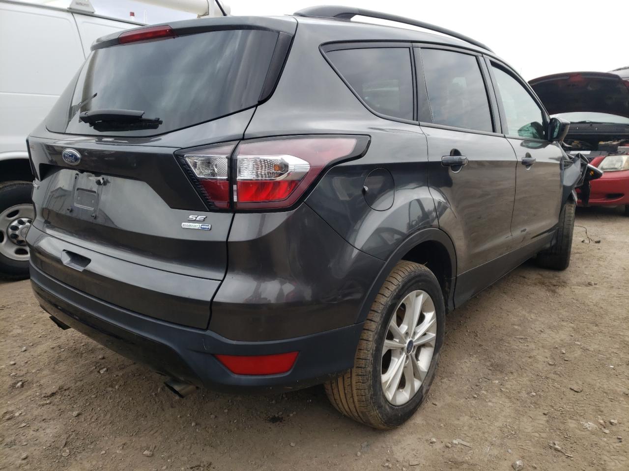 Photo 4 from auction – 2017 FORD ESCAPE SE with VIN 1FMCU9GD3HUC06220