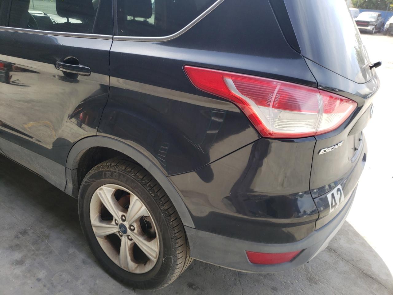 Photo 9 from auction – 2013 FORD ESCAPE SE with VIN 1FMCU9G95DUB65305