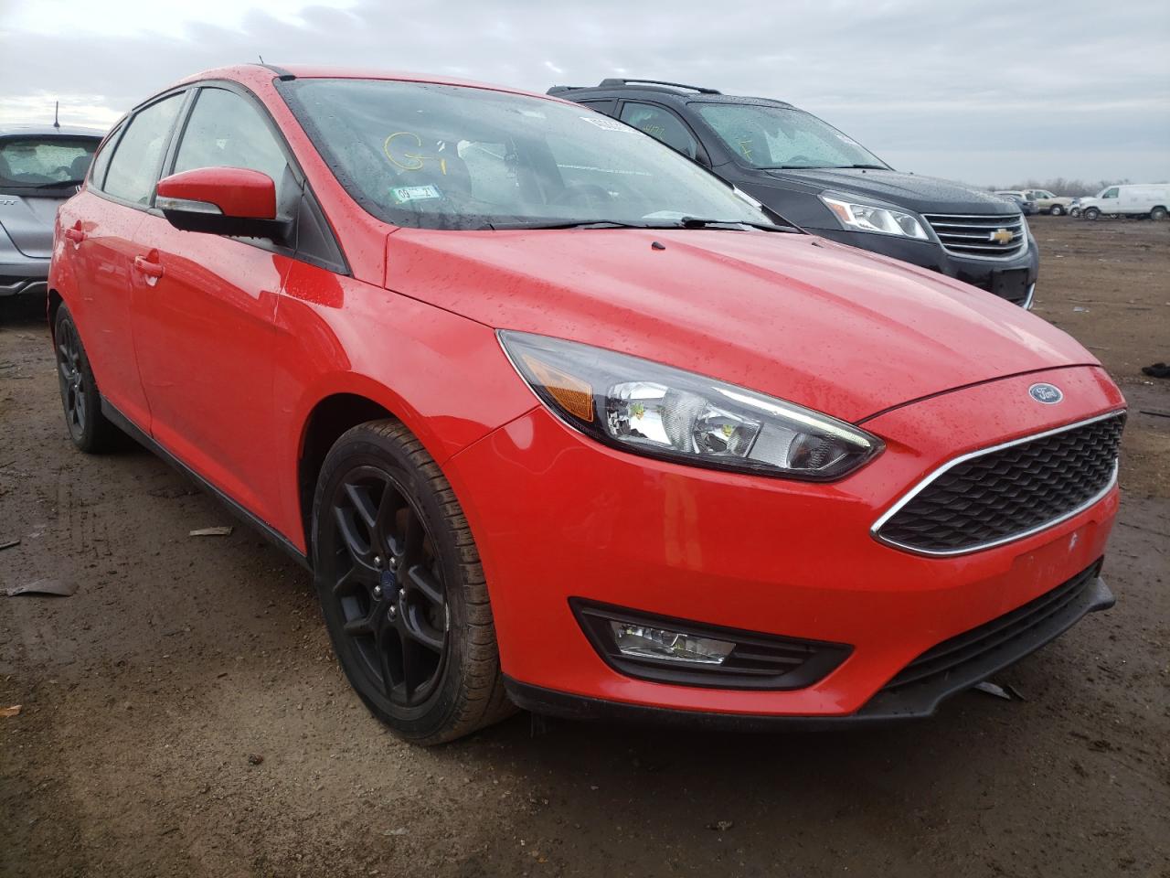 FORD FOCUS SE 2016 with VIN 1FADP3K21GL311612 - Photo from auction