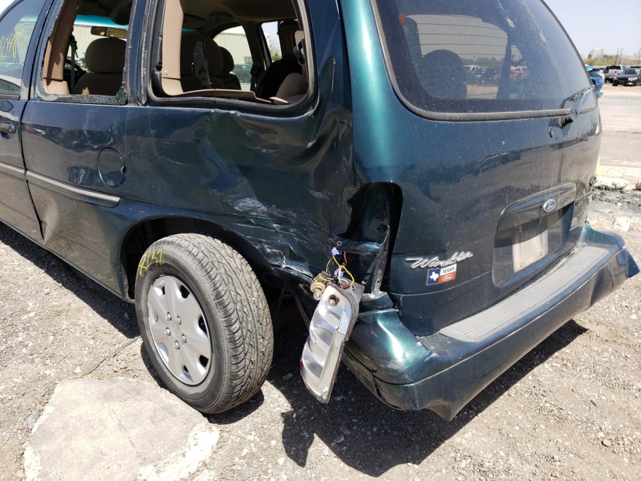 Photo 9 from auction – 1998 FORD WINDSTAR W with VIN 2FMDA514XWBB94505