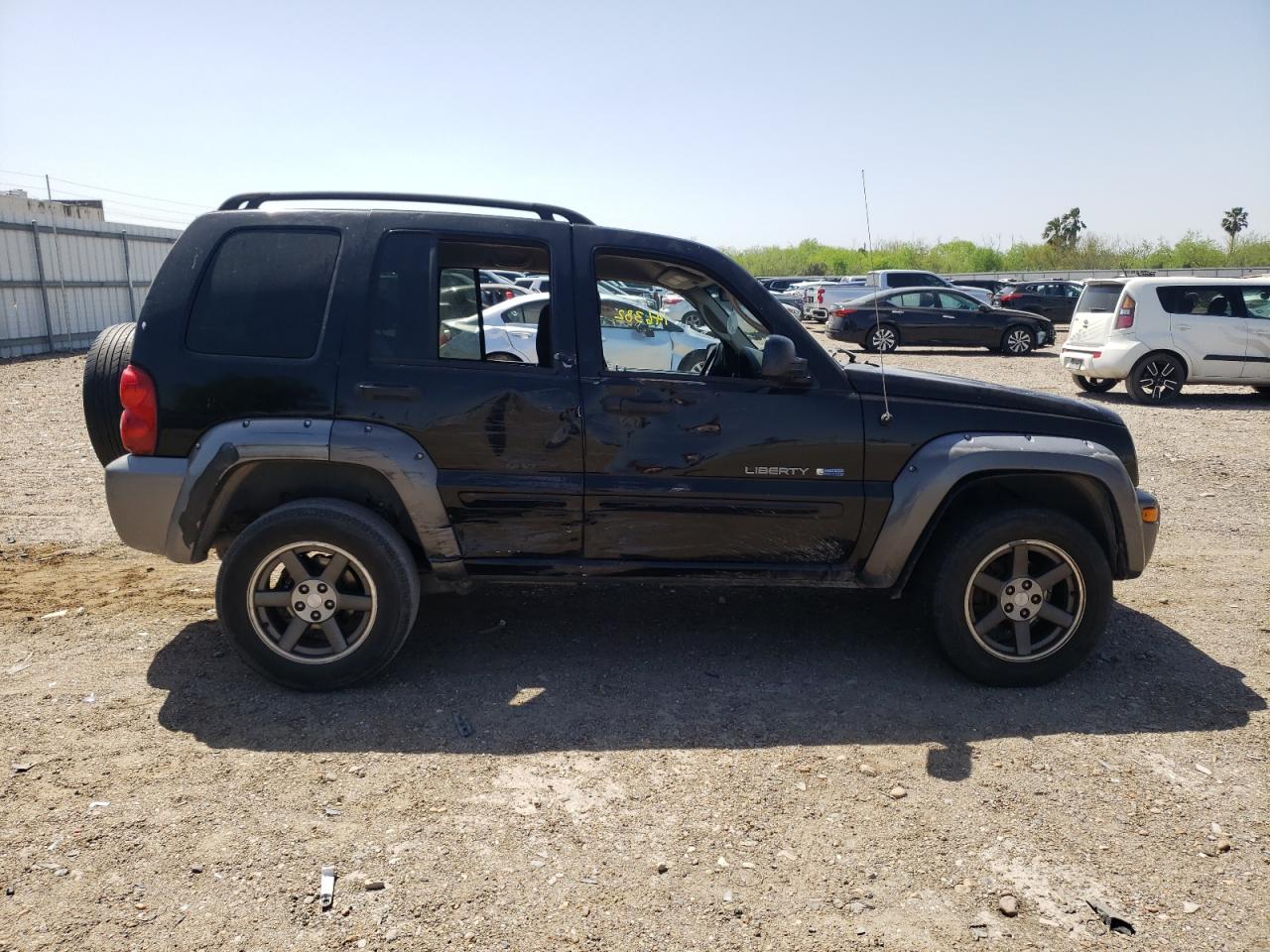 Photo 9 from auction – 2003 JEEP LIBERTY SP with VIN 1J4GK48K03W705690