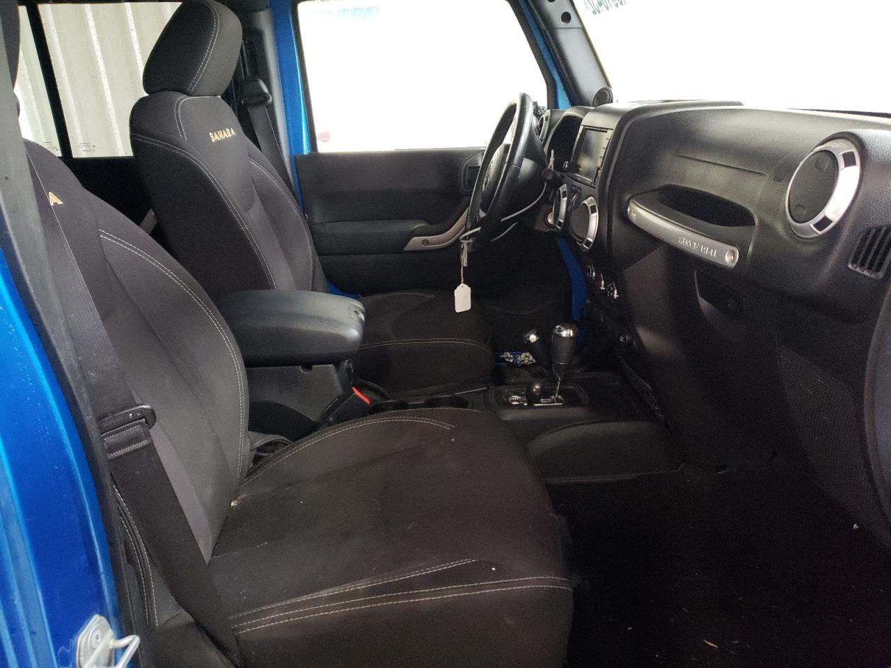 Photo 5 from auction – 2014 JEEP WRANGLER U with VIN 1C4BJWEG1EL252022