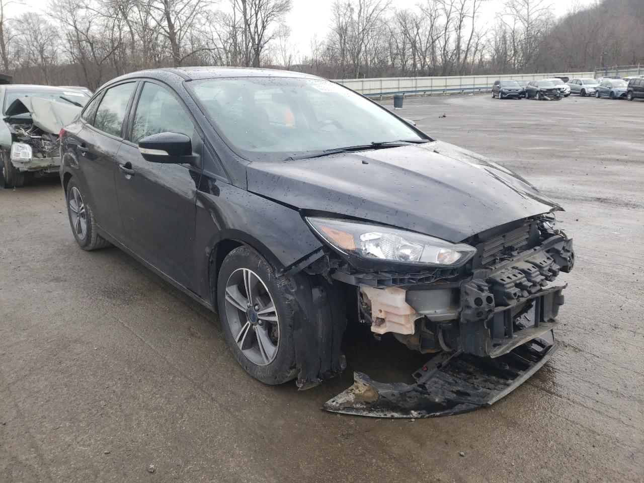 FORD FOCUS SE 2016 with VIN 1FADP3FE8GL302250 - Photo from auction