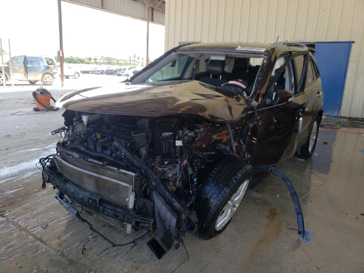 Photo 2 from auction – 2011 KIA SORENTO EX with VIN 5XYKU3A11BG140481