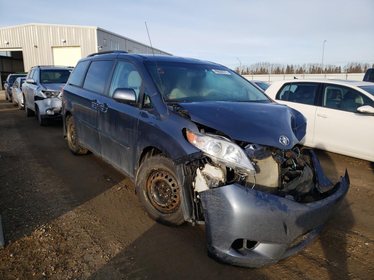 TOYOTA SIENNA LE 2014 with VIN 5TDJK3DC2ES090695 - Photo from auction