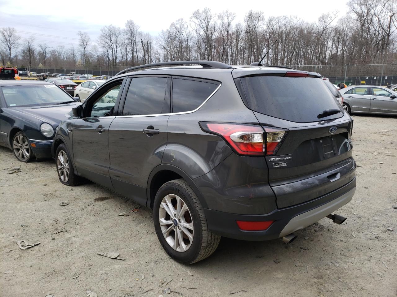 Photo 3 from auction – 2018 FORD ESCAPE SE with VIN 1FMCU0GD8JUD06699