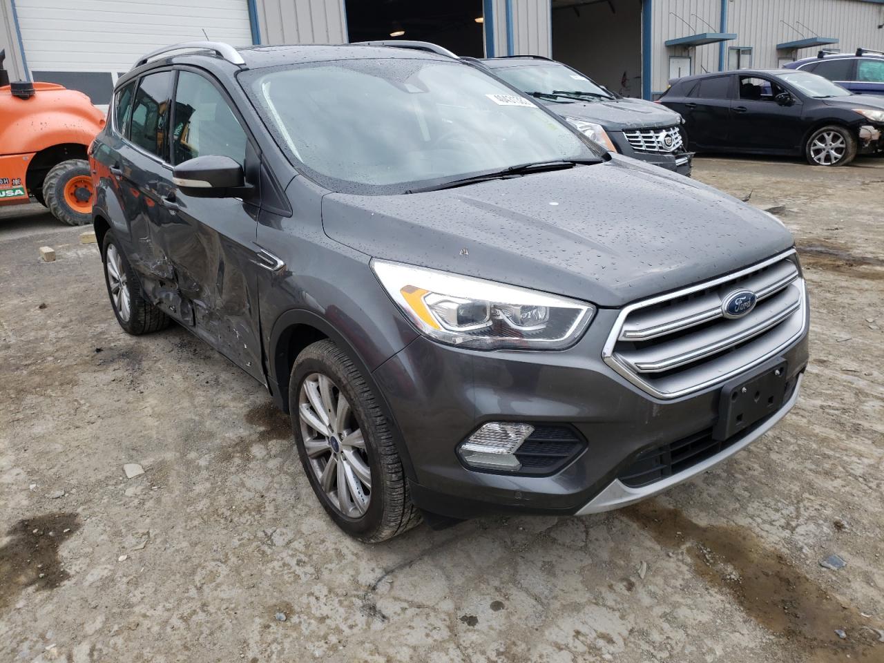 FORD ESCAPE TIT 2017 with VIN 1FMCU9J98HUD90686 - Photo from auction