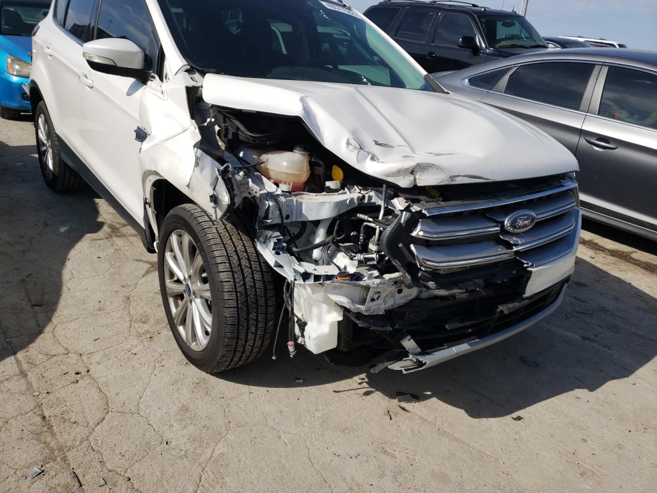 Photo 9 from auction – 2017 FORD ESCAPE TIT with VIN 1FMCU0J91HUB86078