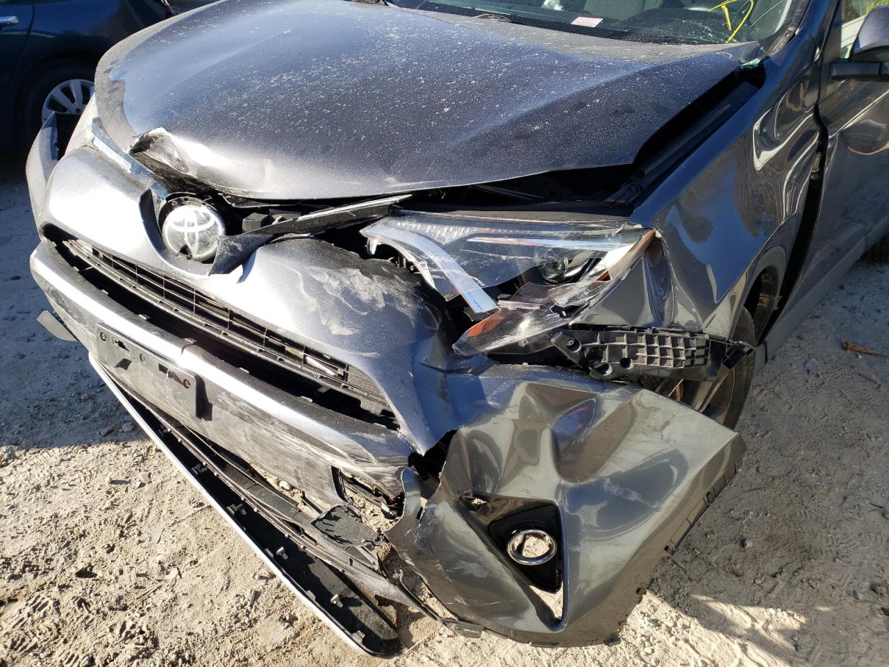 Photo 9 from auction – 2017 TOYOTA RAV4 XLE with VIN 2T3RFREV9HW571041