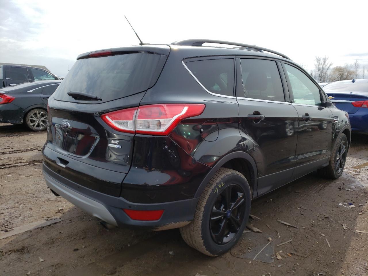 Photo 4 from auction – 2014 FORD ESCAPE SE with VIN 1FMCU9G96EUD95310