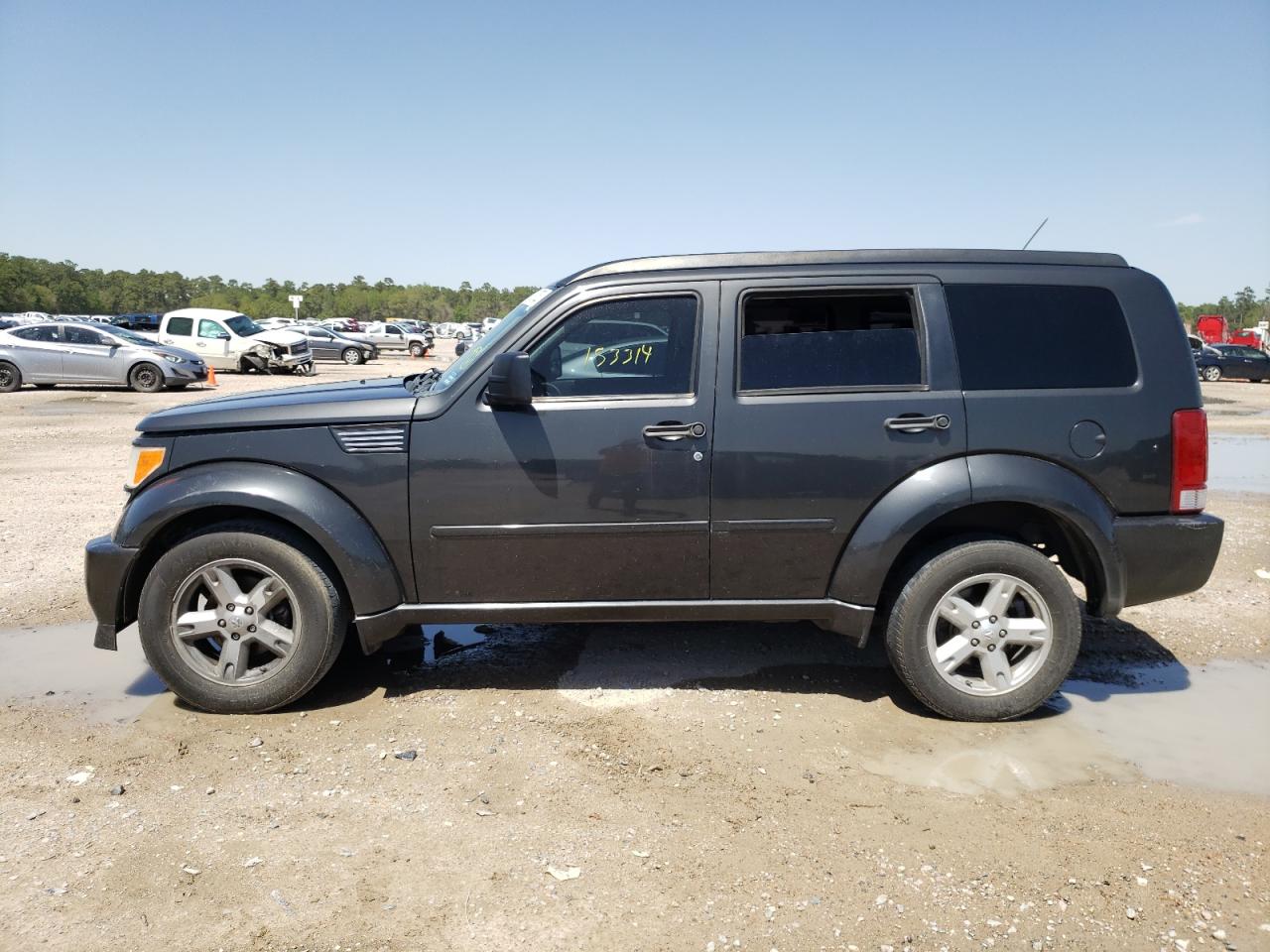 Photo 9 from auction – 2011 DODGE NITRO SXT with VIN 1D4PT5GK5BW509949