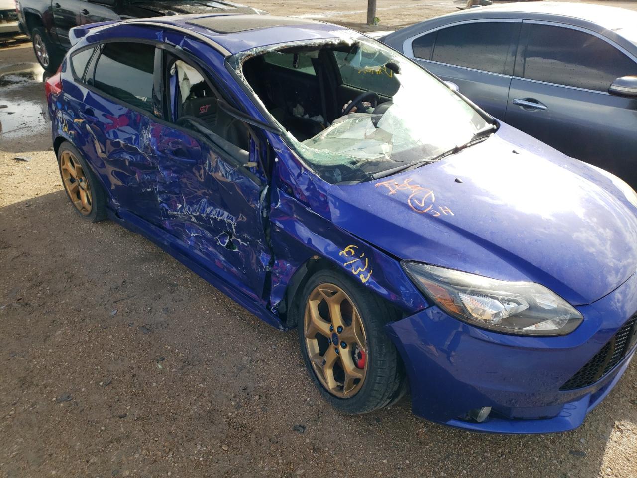 Photo 9 from auction – 2014 FORD FOCUS ST with VIN 1FADP3L95EL398567