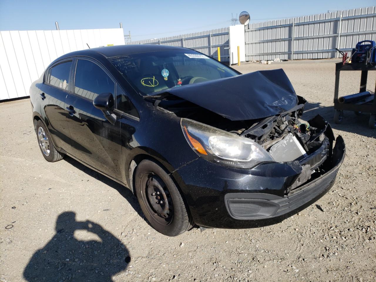 KIA RIO LX 2014 with VIN KNADM4A33E6332621 - Photo from auction