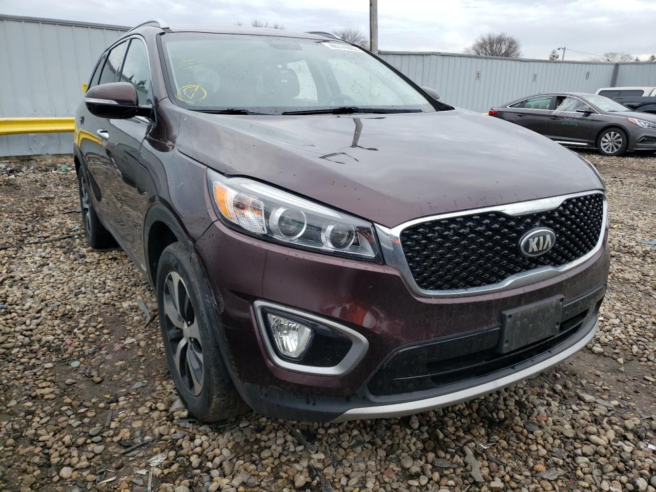 KIA SORENTO EX 2016 with VIN 5XYPHDA15GG021775 - Photo from auction