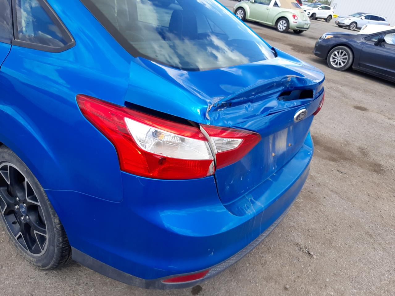 Photo 9 from auction – 2014 FORD FOCUS SE with VIN 1FADP3F27EL348803