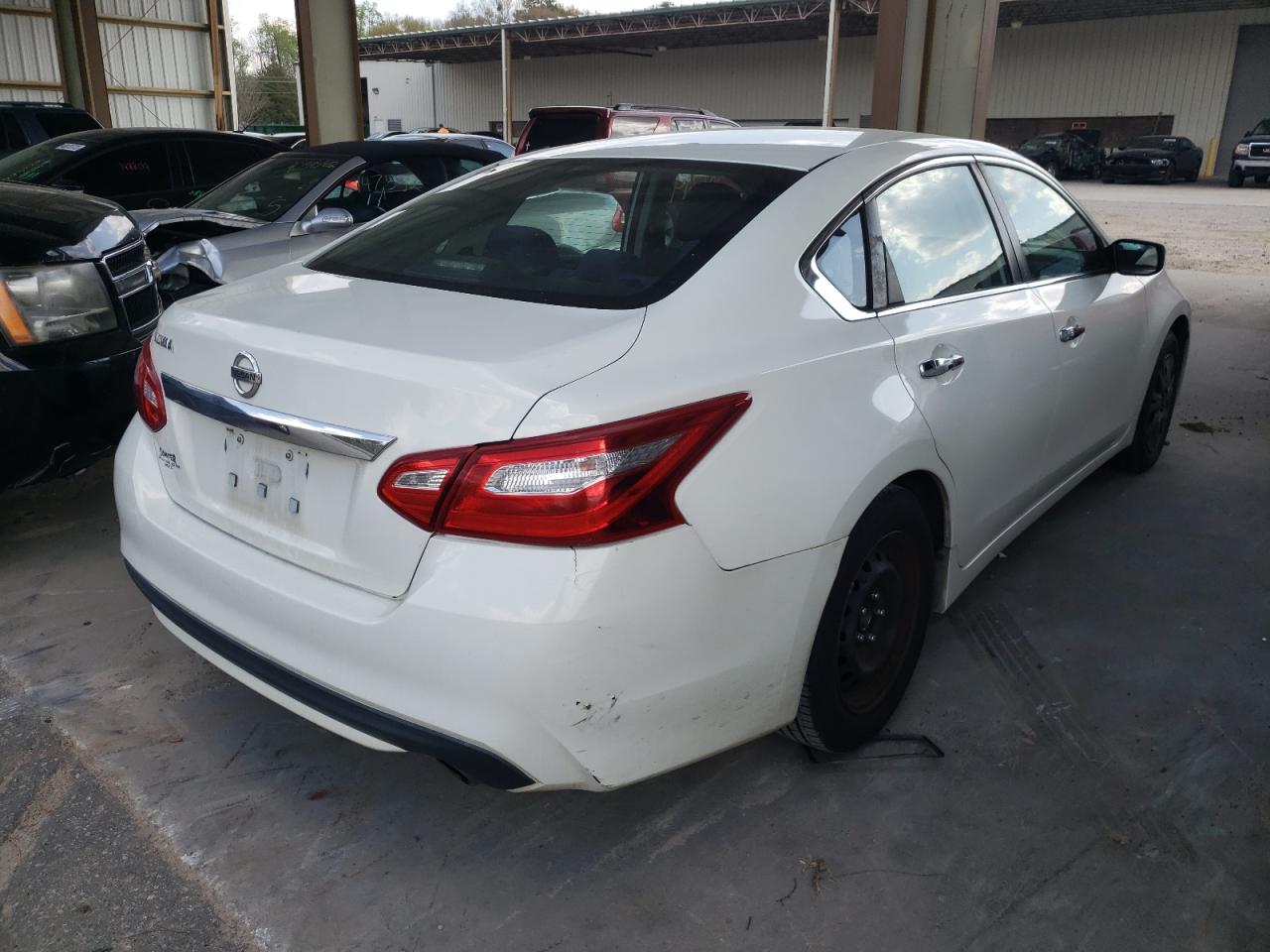 Photo 4 from auction – 2016 NISSAN ALTIMA 2.5 with VIN 1N4AL3AP0GC194133