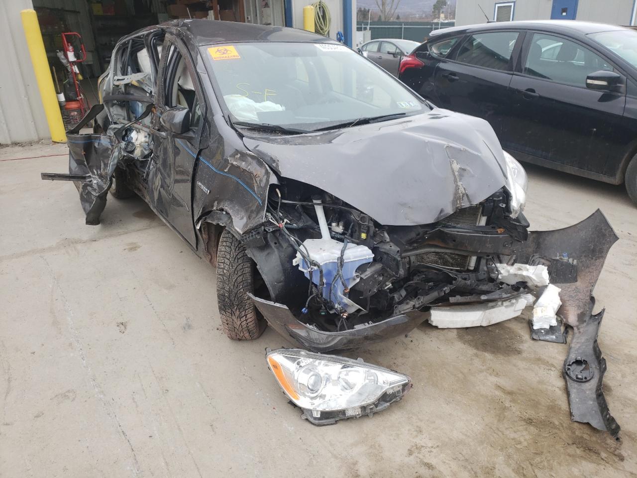 TOYOTA PRIUS C 2014 with VIN JTDKDTB37E1566048 - Photo from auction