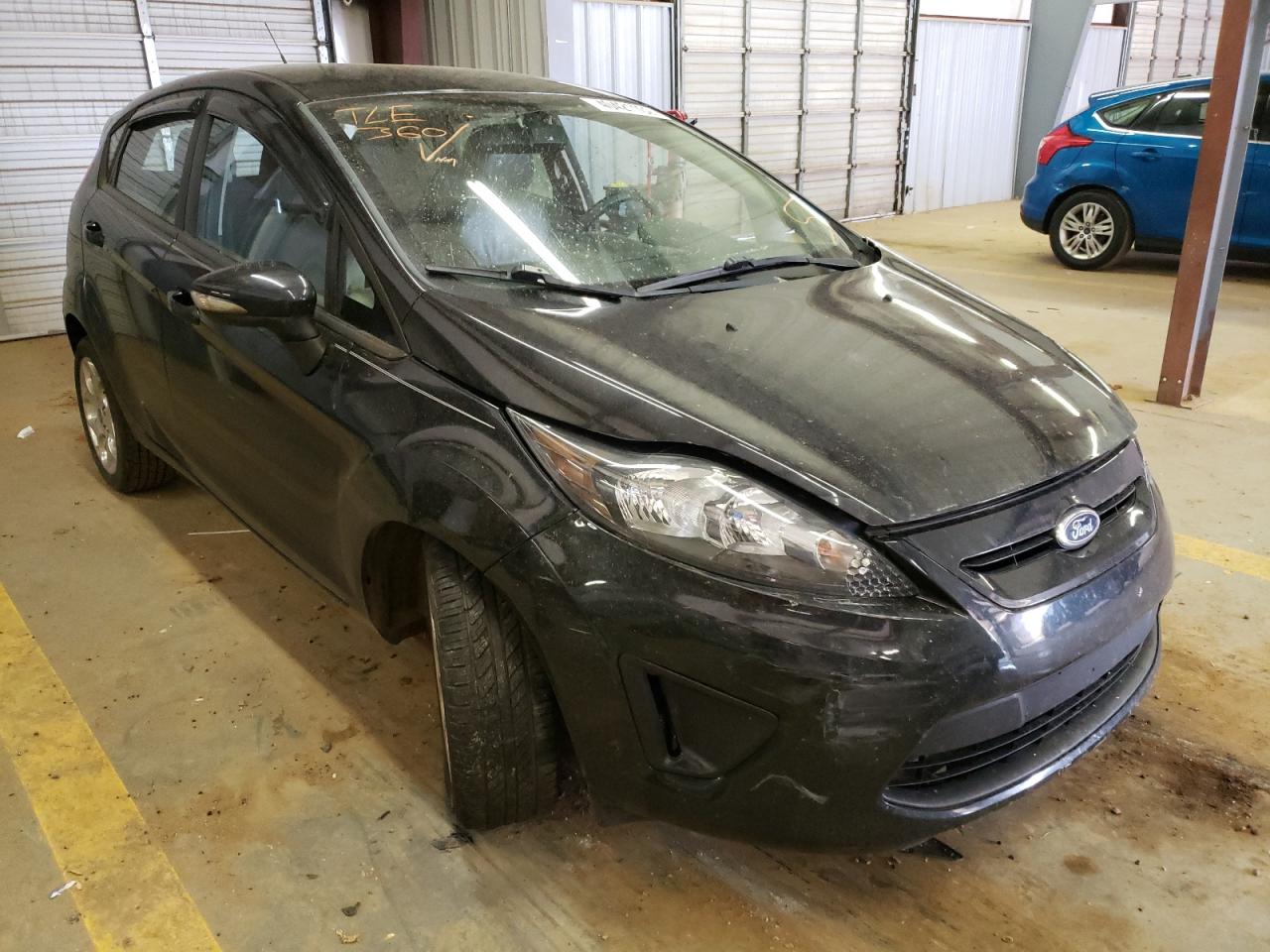 FORD FIESTA TIT 2013 with VIN 3FADP4FJ2DM129662 - Photo from auction