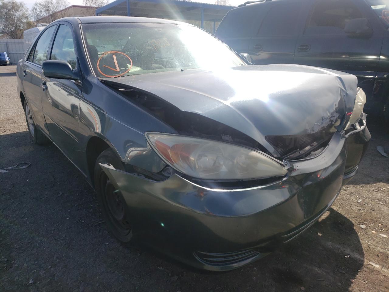 TOYOTA CAMRY LE 2002 with VIN 4T1BE32K32U581530 - Photo from auction